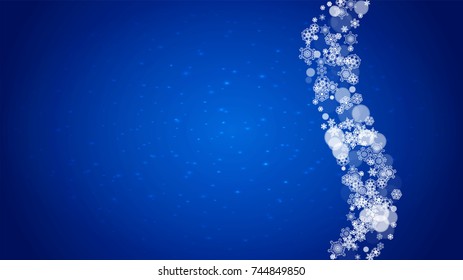 New Year frame with cold snowflakes on blue horizontal background with sparkles. Christmas and New Year frame for gift certificates, ads, banners, flyers, sales offers, event invitations. Falling snow