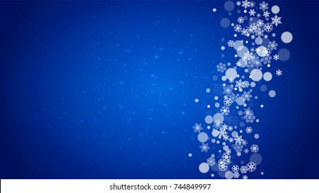New Year frame with cold snowflakes on blue horizontal background with sparkles. Christmas and New Year frame for gift certificates, ads, banners, flyers, sales offers, event invitations. Falling snow