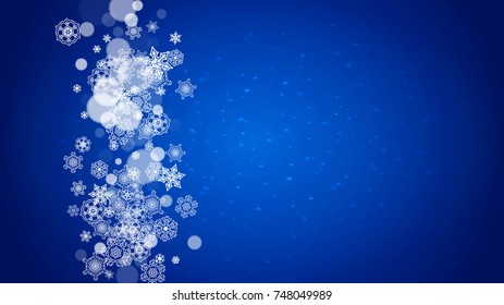 New Year frame with cold snowflakes on blue horizontal background with sparkles. Christmas and New Year frame for gift certificates, ads, banners, flyers, sales offers, event invitations. Falling snow