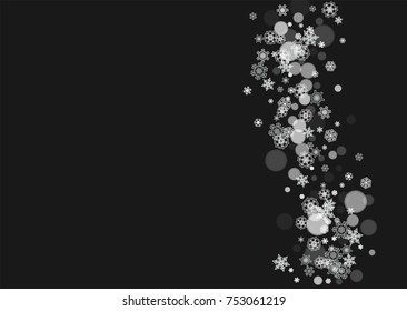 New Year frame with cold snowflakes on black horizontal background. Christmas and New Year frame for gift certificates, ads, banners, flyers, sales offers, event invitations. Falling snow and bokeh
