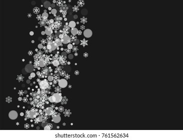 New Year frame with cold snowflakes on black horizontal background. Christmas and New Year frame for gift certificates, ads, banners, flyers, sales offers, event invitations. Falling snow and bokeh