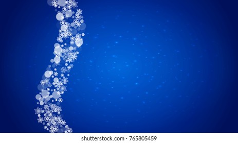 New Year frame with cold snowflakes on blue horizontal background with sparkles. Christmas and New Year frame for gift certificates, ads, banners, flyers, sales offers, event invitations. Falling snow