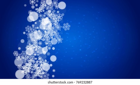 New Year frame with cold snowflakes on blue horizontal background with sparkles. Christmas and New Year frame for gift certificates, ads, banners, flyers, sales offers, event invitations. Falling snow