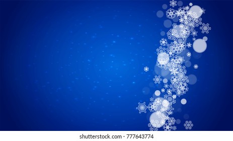 New Year frame with cold snowflakes on blue horizontal background with sparkles. Christmas and New Year frame for gift certificates, ads, banners, flyers, sales offers, event invitations. Falling snow