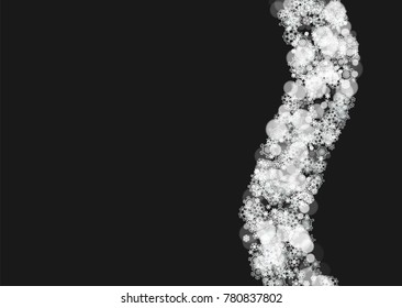 New Year frame with cold snowflakes on black horizontal background. Christmas and New Year frame for gift certificates, ads, banners, flyers, sales offers, event invitations. Falling snow and bokeh