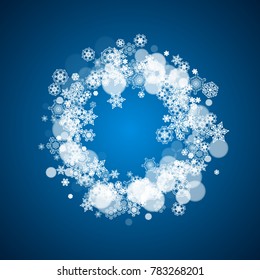 New Year frame with cold snowflakes on blue background. Winter window. Christmas and New Year frame for gift certificates, ads, banners, flyers, sales offers, event invitations. Falling snow and bokeh