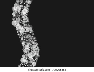 New Year frame with cold snowflakes on black horizontal background. Christmas and New Year frame for gift certificates, ads, banners, flyers, sales offers, event invitations. Falling snow and bokeh