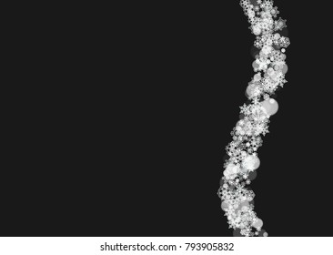 New Year frame with cold snowflakes on black horizontal background. Christmas and New Year frame for gift certificates, ads, banners, flyers, sales offers, event invitations. Falling snow and bokeh