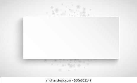 New Year frame with silver snowflakes on white paper background. Horizontal Christmas and New Year frame for gift certificate, ad, banner, flyer, sale offer, event invitation. Glitter snow and sparkle