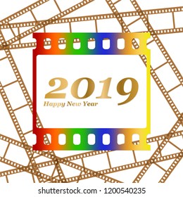 New year greetings for 2019 with colorful blank film and photographic window with golden inscription Happy new year and number 2019 on a background of brown film strips 