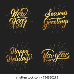 New Year. Happy New Year 2018 hand lettering labels set with gold shiny texture. Hand drawn logo for New Year card, poster, design etc