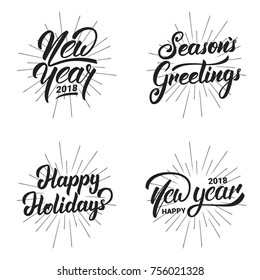 New Year. Happy New Year 2018 hand lettering labels set with gold shiny texture. Hand drawn logo for New Year card, poster, design etc
