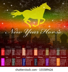 The New Year Horse.Calendar 2014 text paint brush on paper recycle background