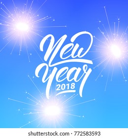 New Year. Lettering New Year 2018 and shiny fireworks sparklers