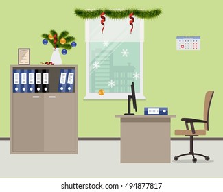 New Year in the office. Workplace of office worker, decorated with Christmas decoration. There is a table, a case, a chair, computer and other objects in beige color on a window background
