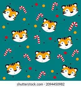New year pattern. Candy, orange tiger head and balls on background.