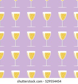 New year pattern with glass of champagne on a gray background