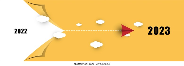 New Year plane track to point, line way. New Year 2023 concept, airplane flying over tearing apart yellow background, seeing 2022 and heading 2023.