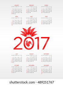 New Year red rooster 2017. Calendar template. Horizontal weeks. First day Monday. Illustration in vector format
