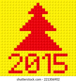 New Year red tree and 2015 in plastic construction kit texture on yellow
