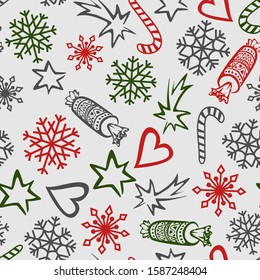 New Year seamless pattern on a gray background. Multi-colored snowflakes, stars, crackers and Christmas candies are scattered randomly. Vector for greeting cards, backgrounds, wrapping paper.