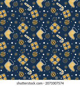 New Year seamless pattern. Yellow and white Christmas elements on a blue background.