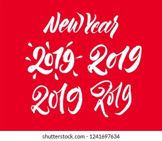 New Year set. 2019 brush pen lettering numbers. Modern calligraphy. White on red expresive sign. Vector ink eps 10. Handwriting calligraphic text and numbers.