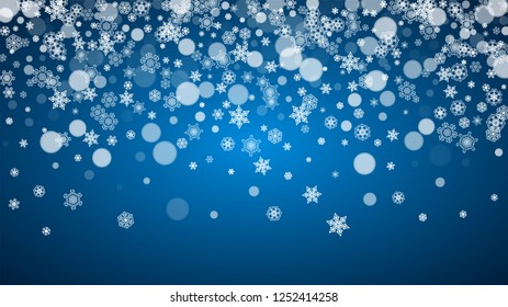 New Year snow on blue background. Winter theme. Horizontal Christmas and New Year snow falling backdrop. For season sale, special offer, banners, card, party invites, flyers. White snowflakes on blue.