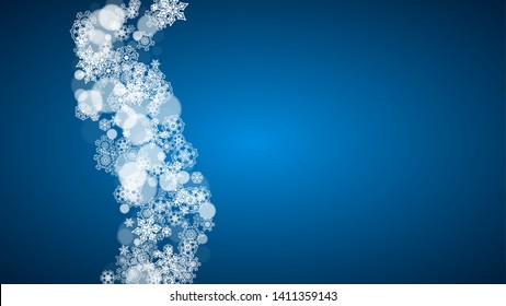 New Year snow on blue background. Winter theme. Horizontal Christmas and New Year snow falling backdrop. For season sale, special offer, banners, card, party invites, flyers. White snowflakes on blue.