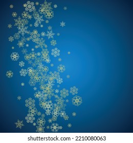 New Year snow on blue background. Gold glitter snowflakes. Christmas and New Year snow falling backdrop. For season sales, special offers, banners, cards, party invites, flyers. Frosty winter on blue.