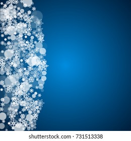 New Year snow on blue background. Winter theme. Christmas and New Year snow falling backdrop. For season sales, special offers, banners, cards, party invites, flyers. White frosty snowflakes on blue.
