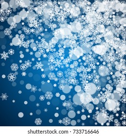 New Year snow on blue background. Winter theme. Christmas and New Year snow falling backdrop. For season sales, special offers, banners, cards, party invites, flyers. White frosty snowflakes on blue.