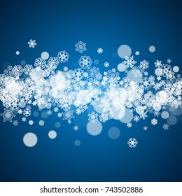 New Year snow on blue background. Winter theme. Christmas and New Year snow falling backdrop. For season sales, special offers, banners, cards, party invites, flyers. White frosty snowflakes on blue.