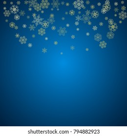 New Year snow on blue background. Gold glitter snowflakes. Christmas and New Year snow falling backdrop. For season sales, special offers, banners, cards, party invites, flyers. Frosty winter on blue.