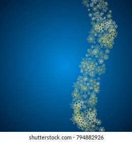New Year snow on blue background. Gold glitter snowflakes. Christmas and New Year snow falling backdrop. For season sales, special offers, banners, cards, party invites, flyers. Frosty winter on blue.