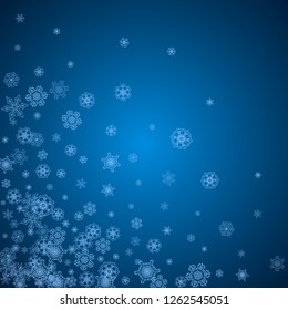 New Year snowflakes on blue background with sparkles. Winter theme. Christmas and New Year snowflakes  falling. For season sales, special offer, banners, cards, party invites, flyer. White frosty snow