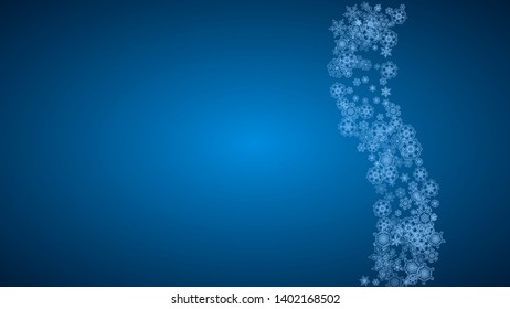 New Year snowflakes on blue background with sparkles. Horizontal Christmas and New Year snowflakes  falling. For season sales, special offer, banners, cards, party invites, flyer. White frosty snow