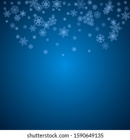 New Year snowflakes on blue background with sparkles. Winter theme. Christmas and New Year snowflakes falling. For season sales, special offer, banners, cards, party invites, flyer. White frosty snow
