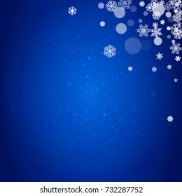 New Year snowflakes on blue background with sparkles. Winter theme. Christmas and New Year snowflakes falling. For season sales, special offer, banners, cards, party invites, flyers. White frosty snow