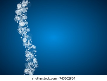 New Year snowflakes on blue background. Horizontal winter theme. Christmas and New Year snowflakes falling. For season sales, special offer, banners, cards, party invites, flyers. White frosty snow