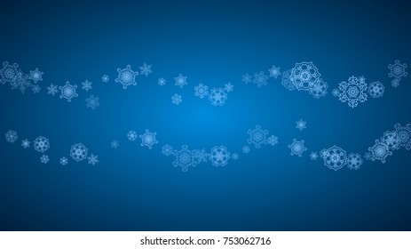 New Year snowflakes on blue background with sparkles. Horizontal Christmas and New Year snowflakes  falling. For season sales, special offer, banners, cards, party invites, flyer. White frosty snow