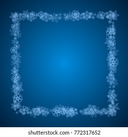 New Year snowflakes on blue background with sparkles. Winter theme. Christmas and New Year snowflakes  falling. For season sales, special offer, banners, cards, party invites, flyer. White frosty snow