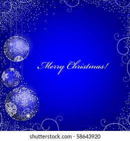 New year theme with decorative balls and copyspace in the blue