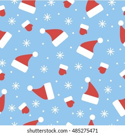 New Year and Xmas seamless vector pattern. Hats, mittens and snowflakes on the light blue background.