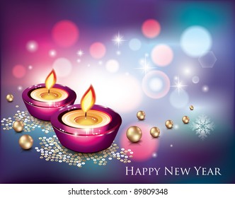 New Years Background/Abstract Bokeh Lights and Christmas Candles
