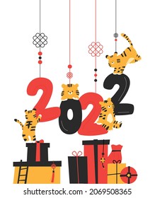 New Year's card. Gift boxes are stacked under the 2022 number, and tigers are playing tricks on the number. flat design style vector illustration.