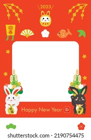 New Year's card illustration with photo frame of the Year of the Rabbit and Japanese letter. Translation : "Greeting the New Year" "Rabbit" "Good luck Charm" "Good luck"