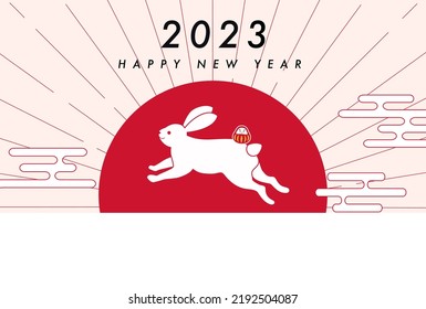 New Year's card with a rabbit and the first sunrise of the year.