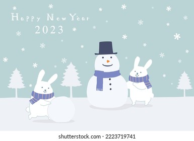 New Year's card with a rabbit making a snowman