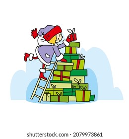 New Year's and Christmas. A girl decorates a Christmas tree made from gift boxes.